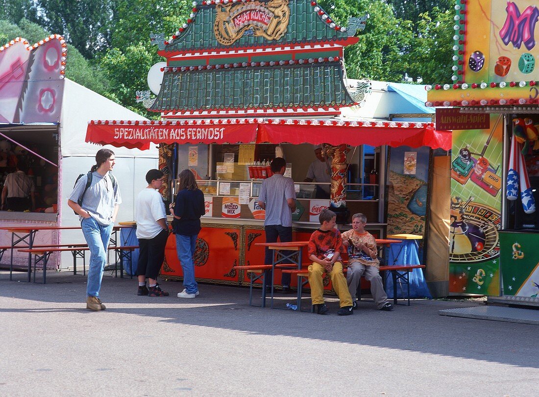 Stall with Asian Specialties at the May Fair in Regensburg