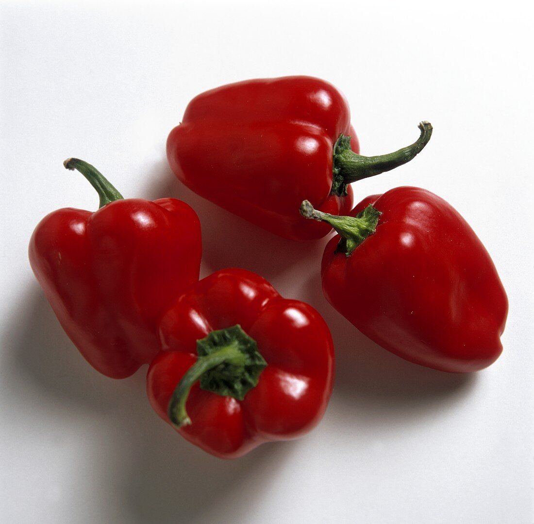 Four Red Bell Peppers