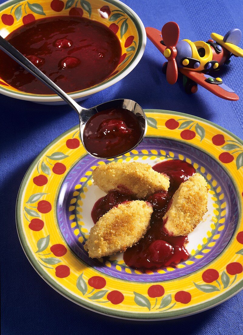 Quark & semolina dumplings with cherry sauce (for children)