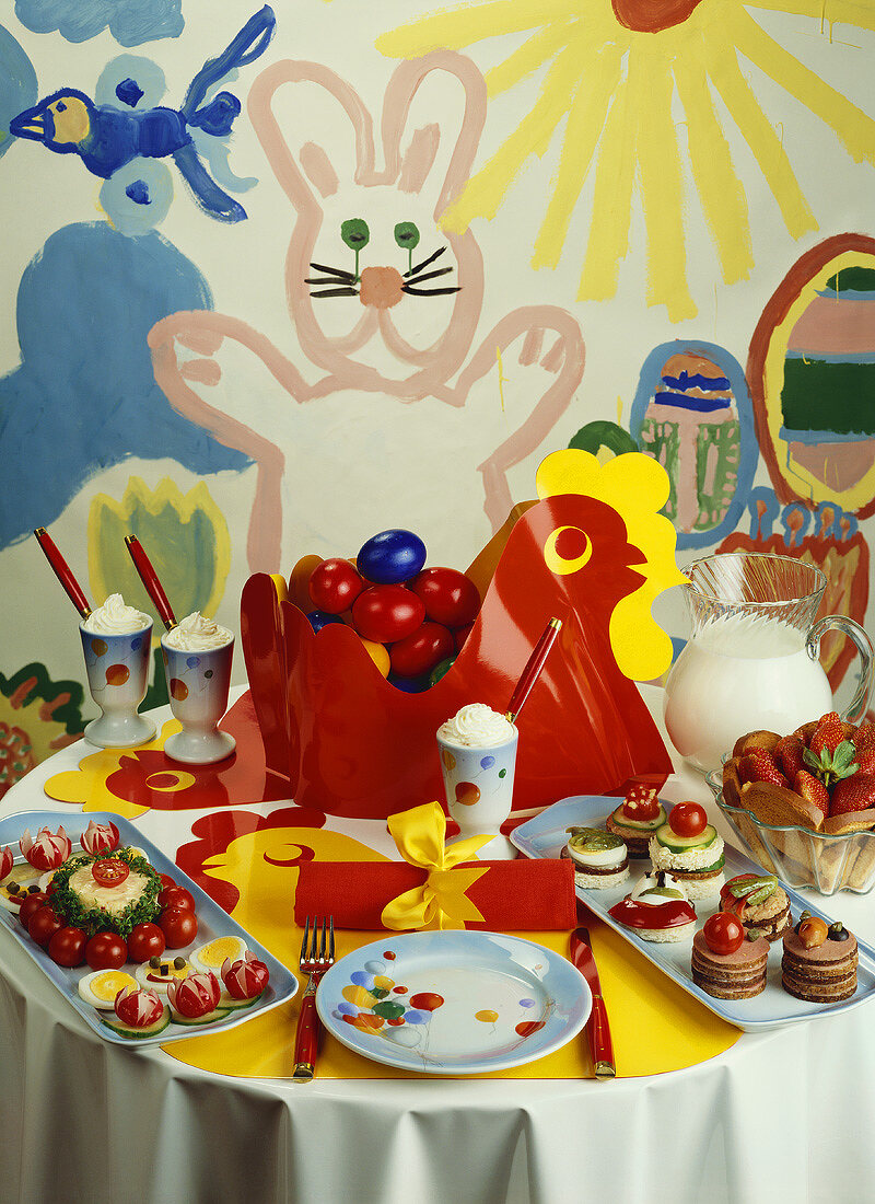 Children's Easter table with savoury snacks and cocoa