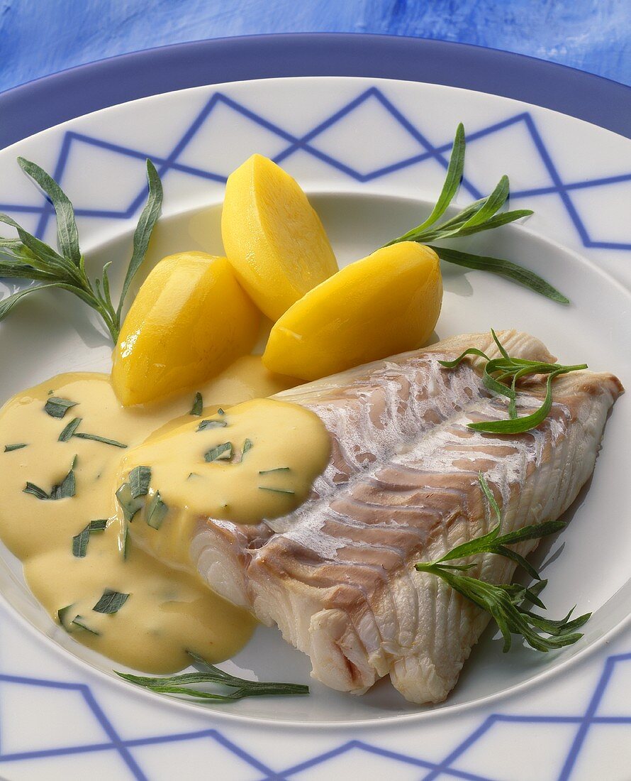 Coley fillet with potatoes & hollandaise sauce