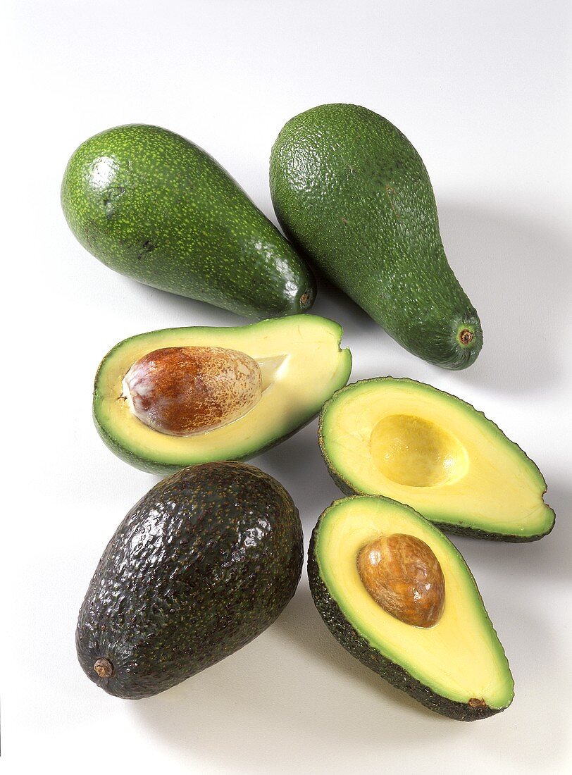 Several Split and Whole Avocados