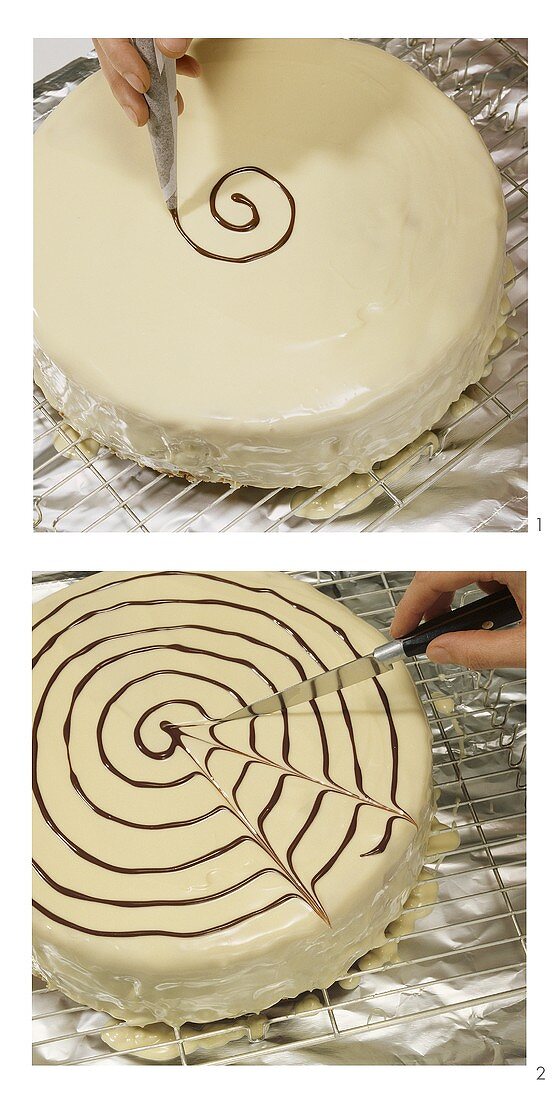 Decorating white cake with brown cobweb design