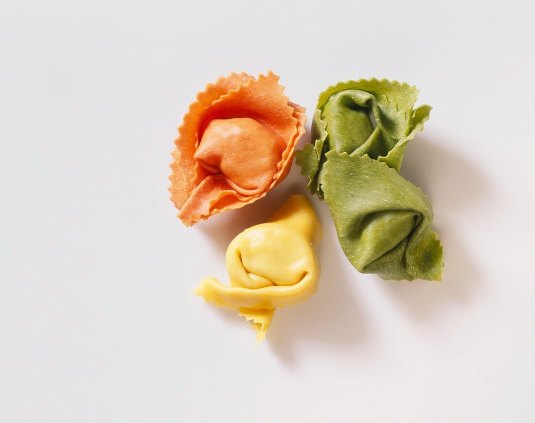 Green, yellow & red filled pasta tubes (like tortellini)