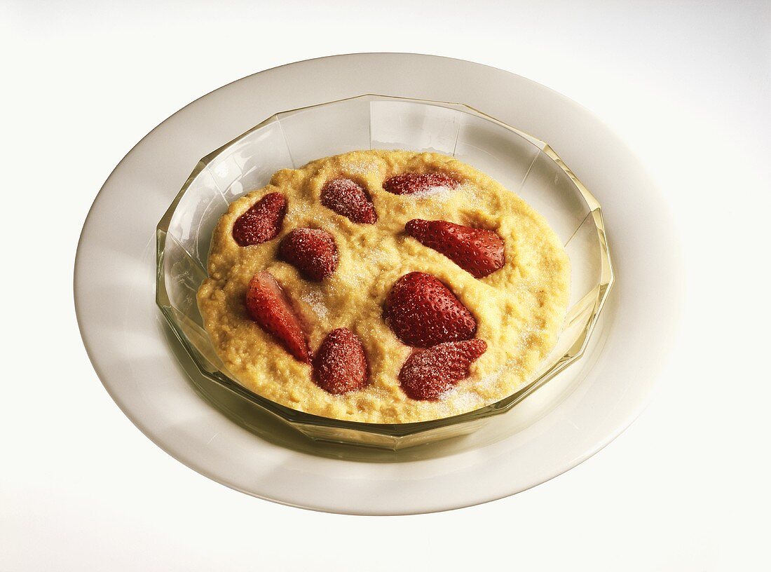 Semolina with strawberries in dessert bowl