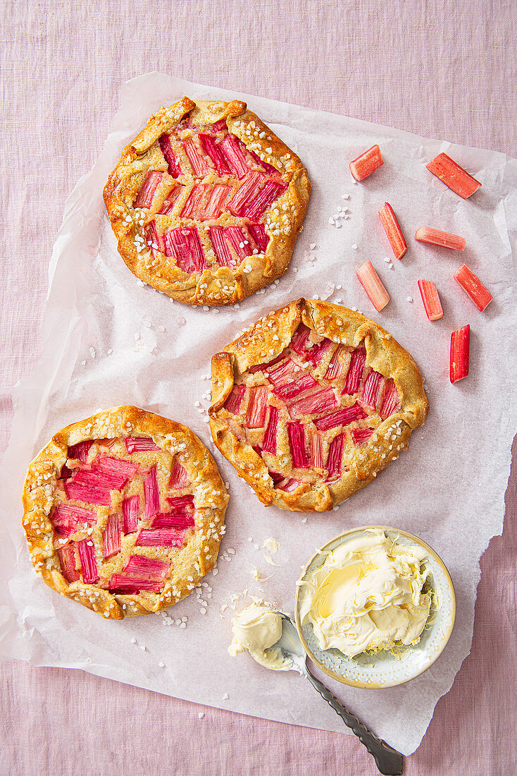 Rhubarb and almond galette with clotted cream, view from above.
