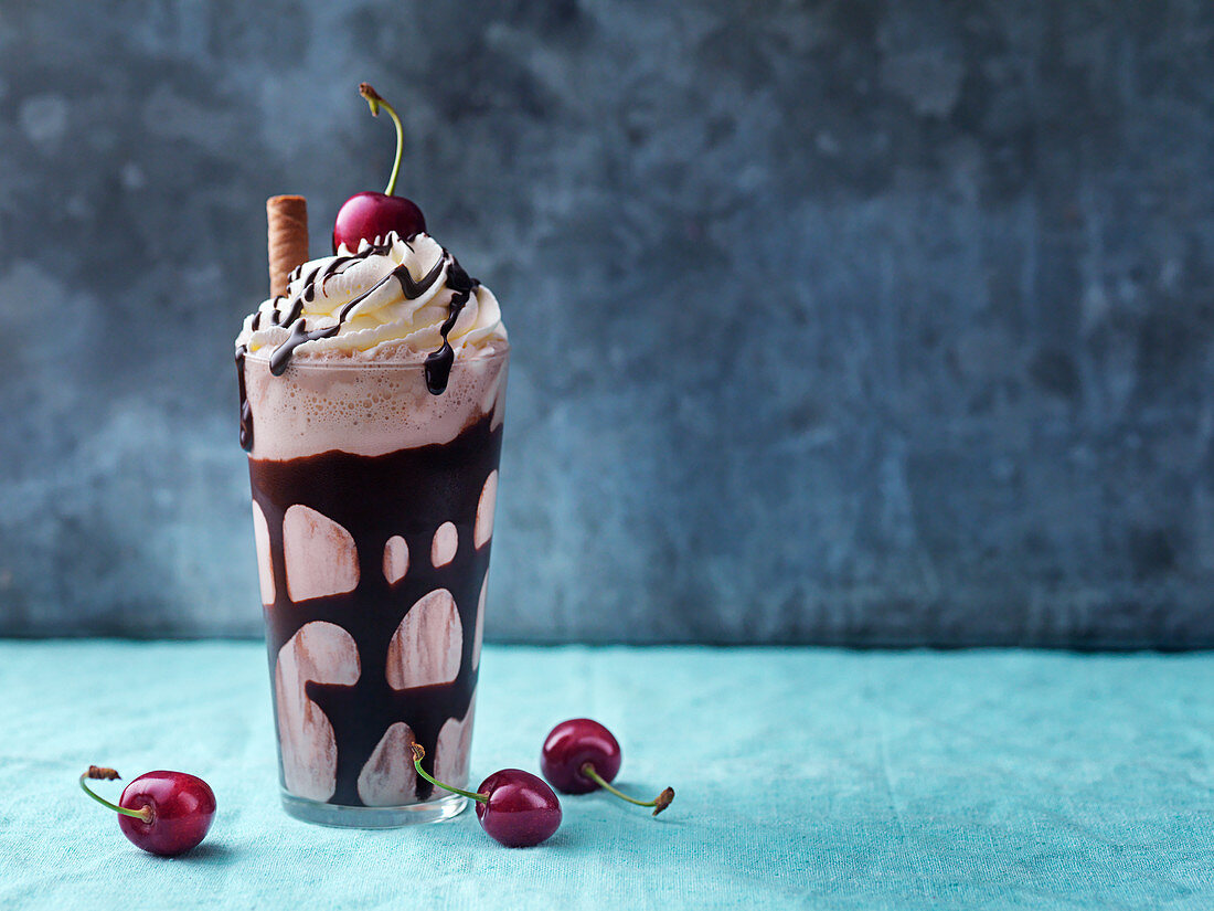 freakshake, milkshake, ice cream, cherries, chocolate sauce, whipped cream