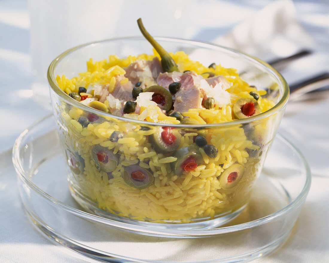 Rice salad with tuna fish, olives and capers
