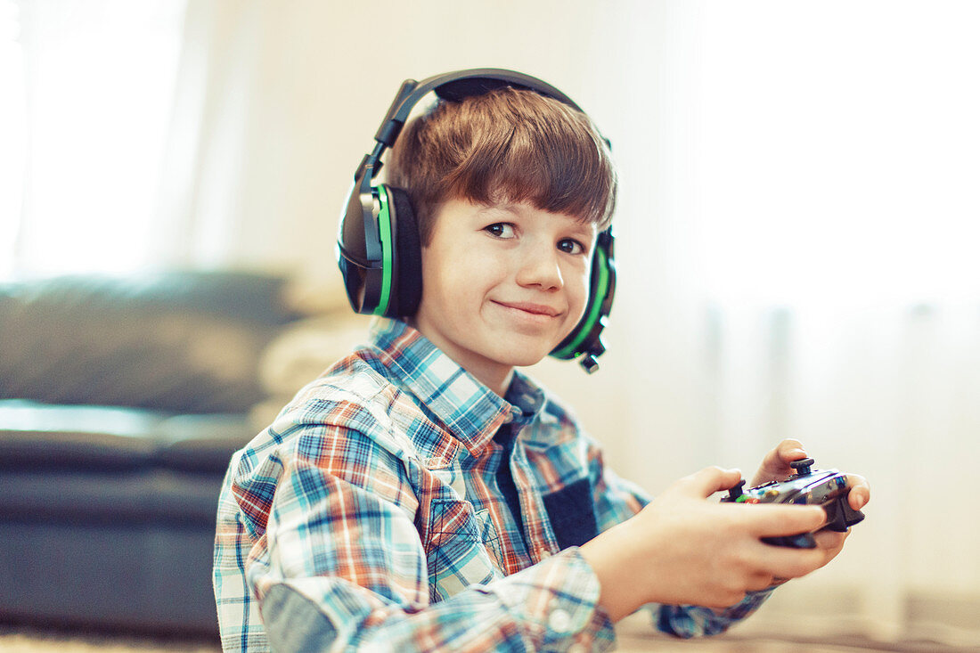 Young boy playing video game