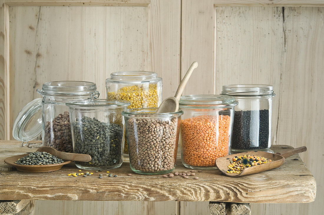 Different types of lentils in mason jars