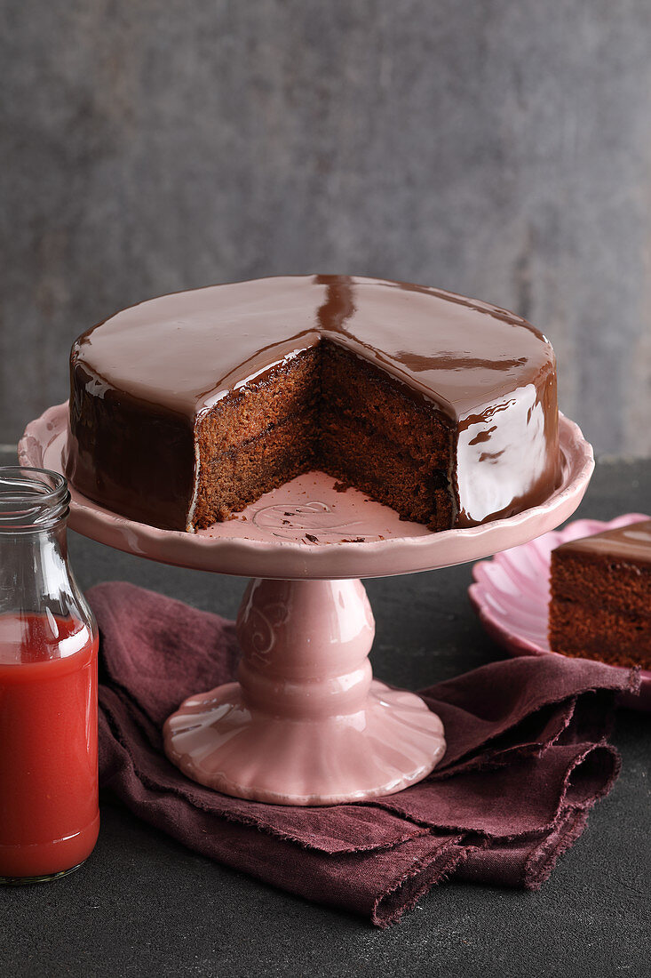 A chocolate cake made with blood orange juice