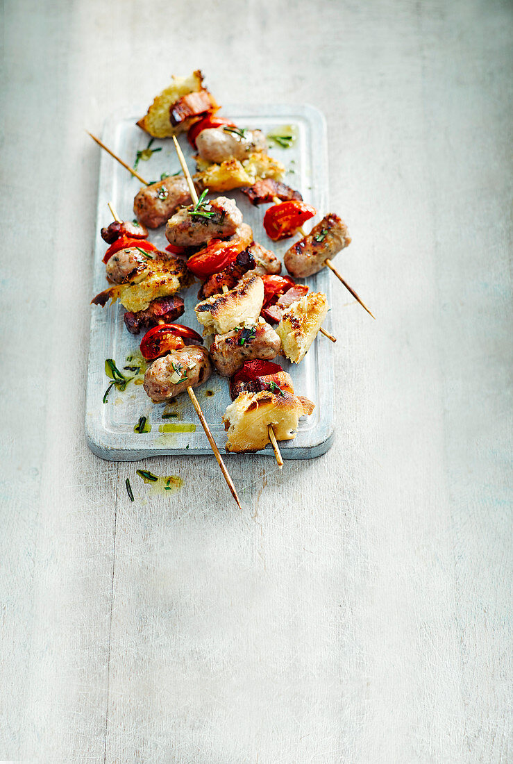 Sausage and pancetta skewers