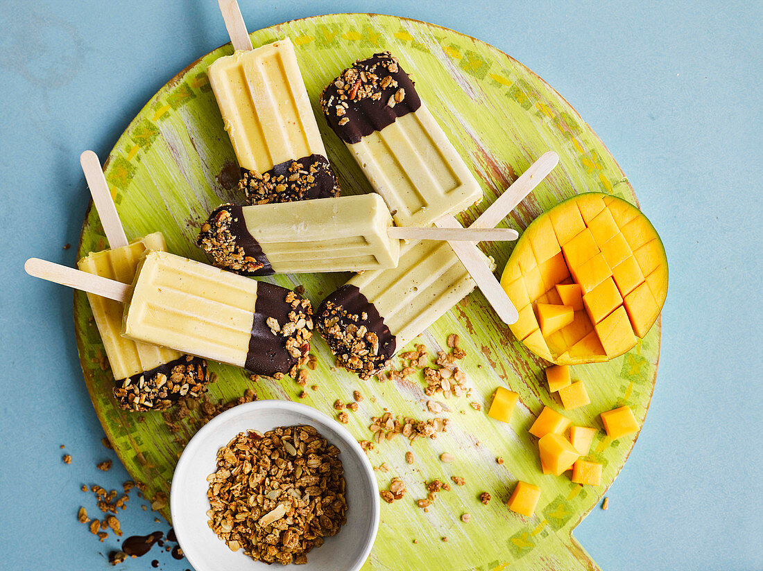 Tropical granola lollies with mango, bananas and coconut milk