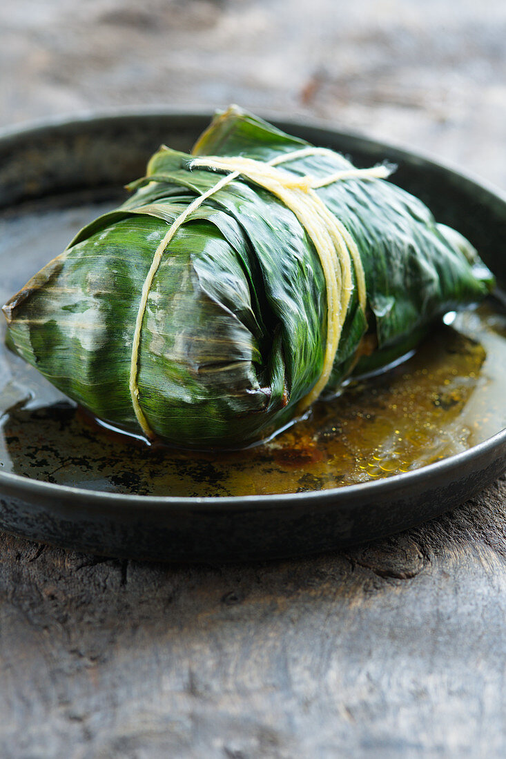 Mackerel cooked in banana leaves (Asia)