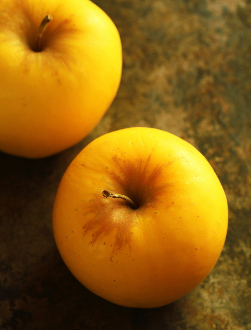 Two yellow apples