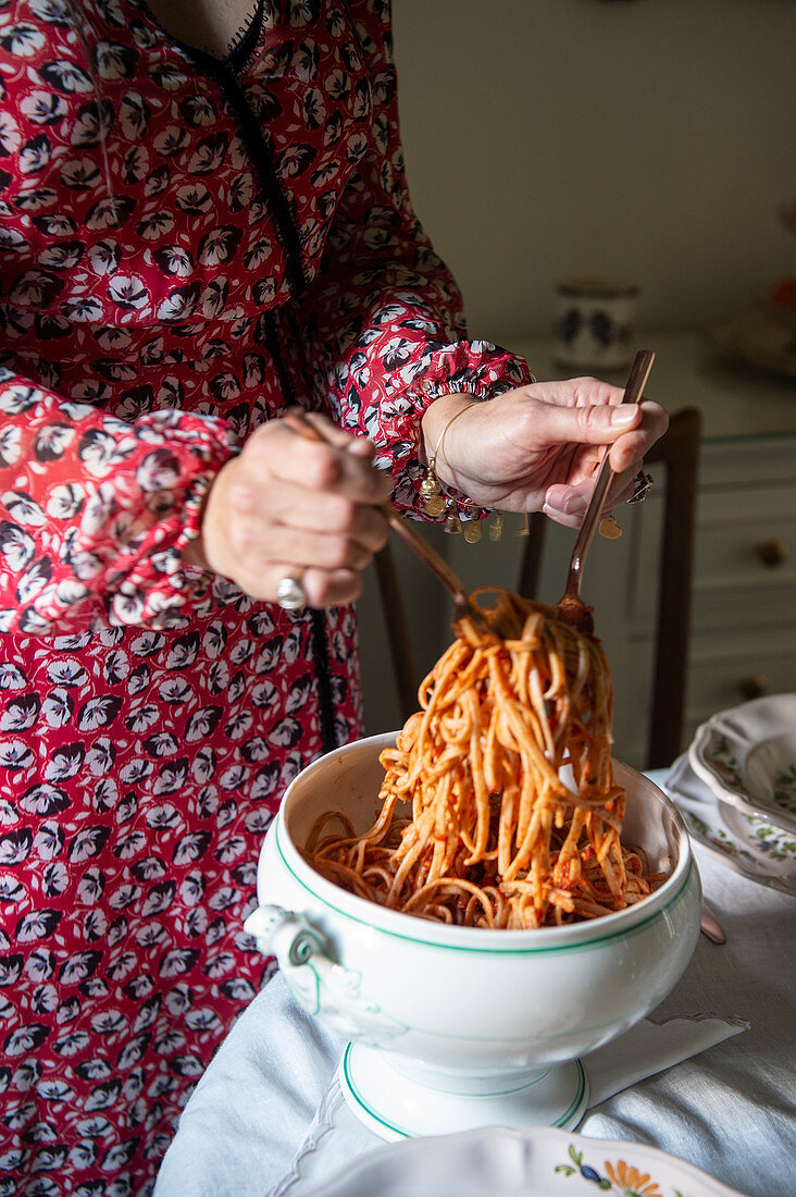 Pasta being served from a terrine