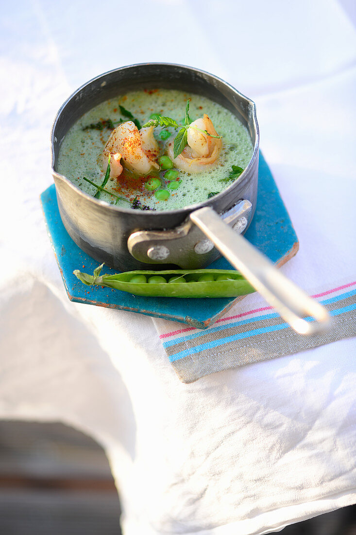 Turkish pea and mint soup with prawns