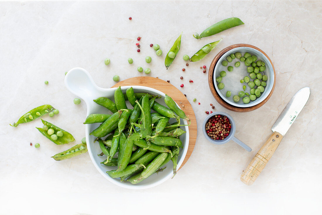 Fresh peas in pods and chopped
