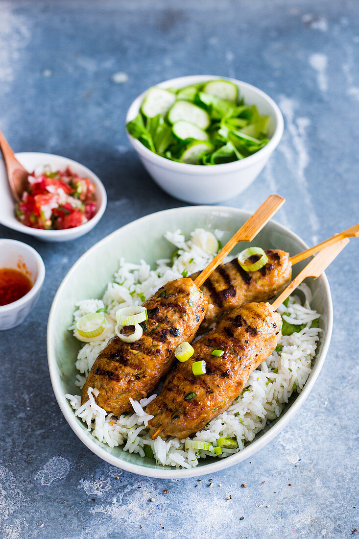 Turkey turmeric skewers on rice