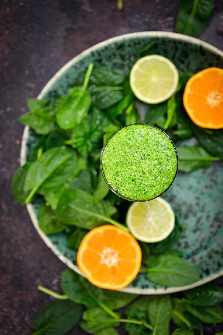 Green smoothie made of spinach and citrus
