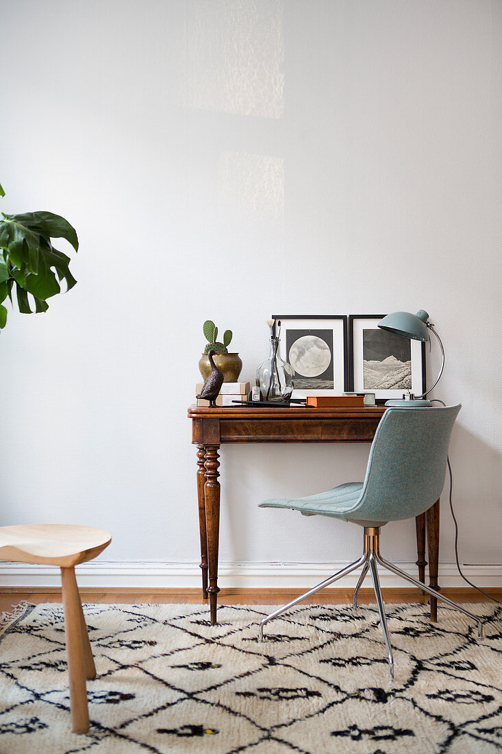 Antique desk and chair on Berber rug