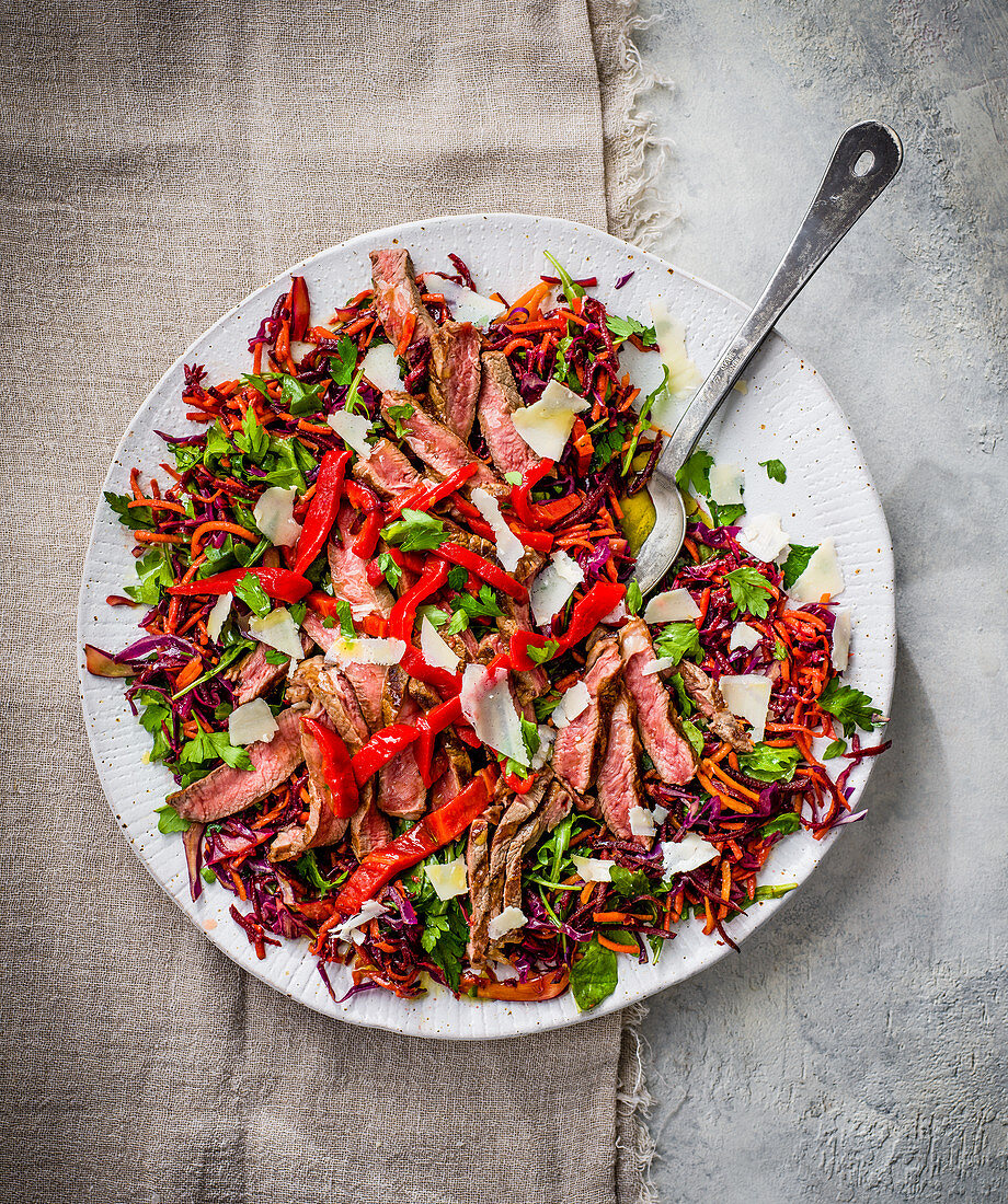 Steak tagliata with zingy carrot and cabbage slaw