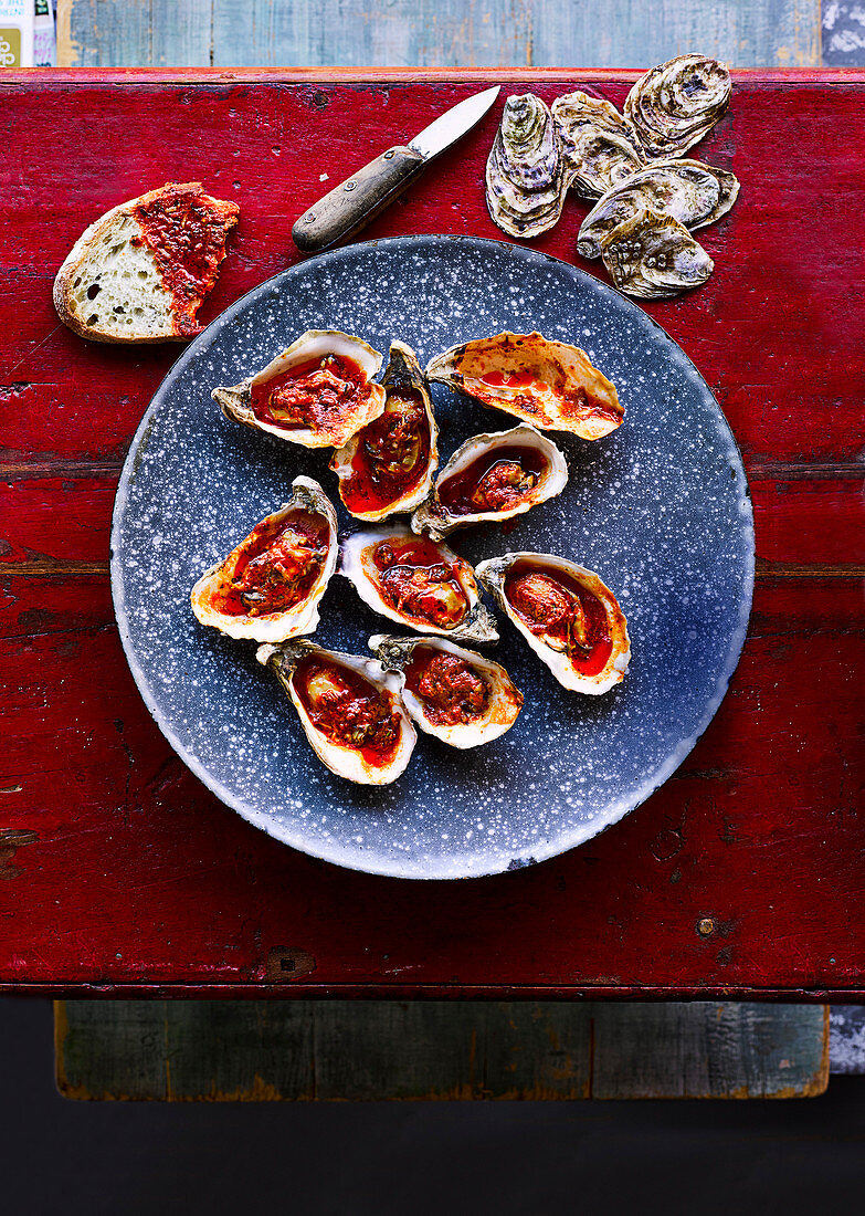 Barbecued oysters with garlic, paprika and Parmesan butter