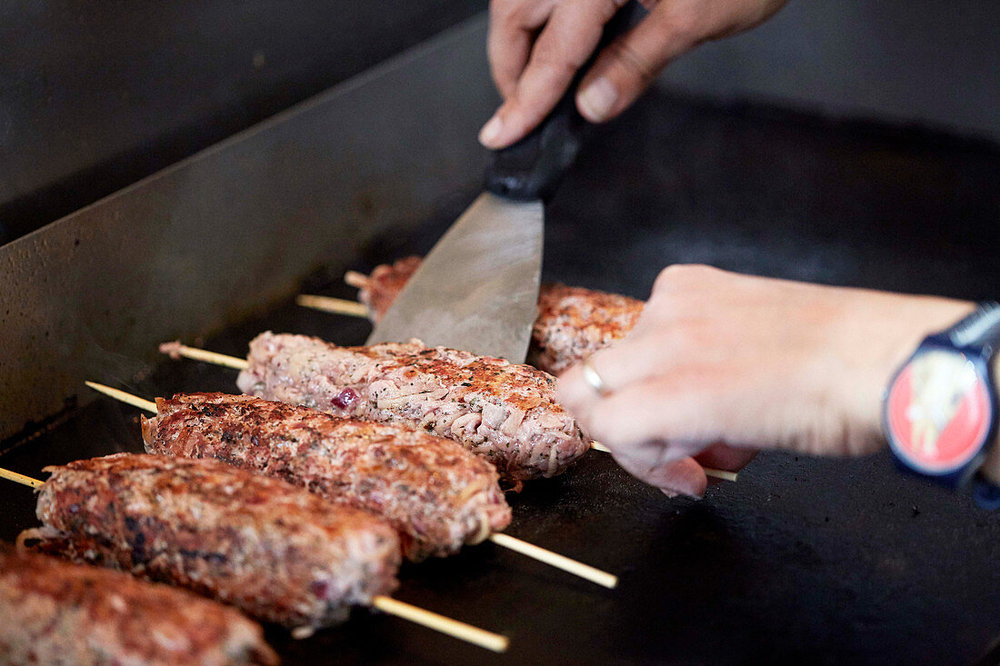 Grilling goat koftas