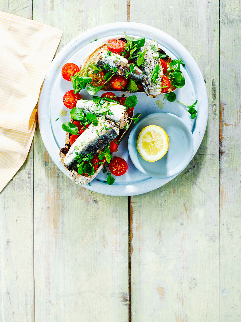 Sardines and tomatoes on toast