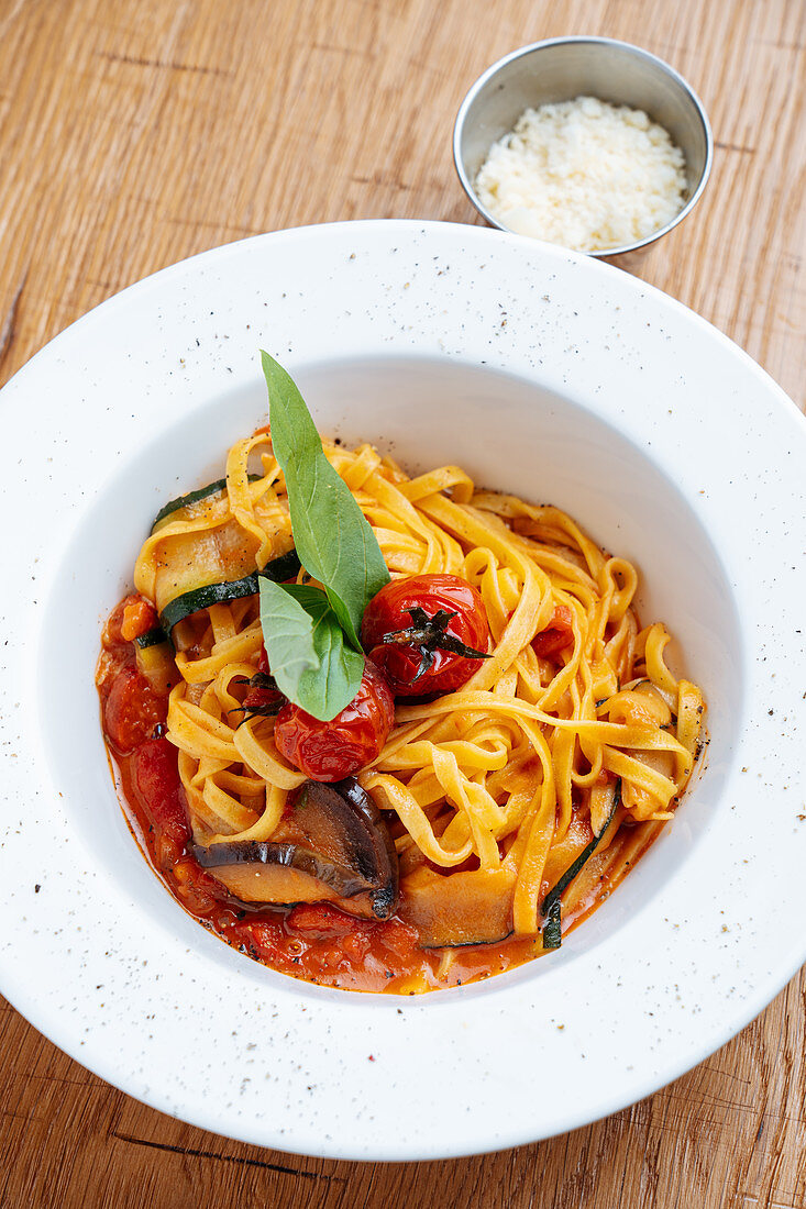 Tagliatelle with courgette, aubergines and tomatoes