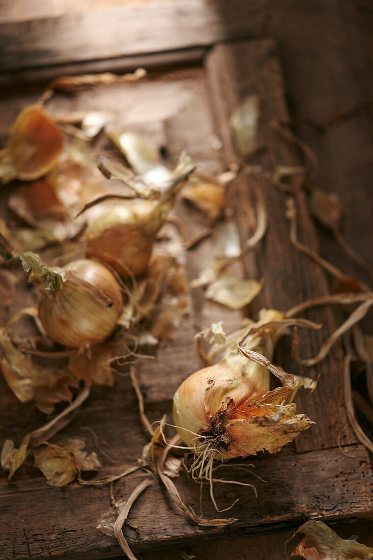 Onions on a wooden background