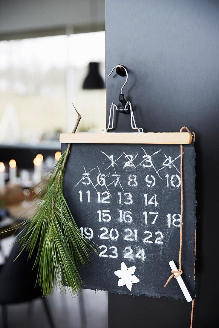 Waiting for Christmas: dates crossed of on chalkboard