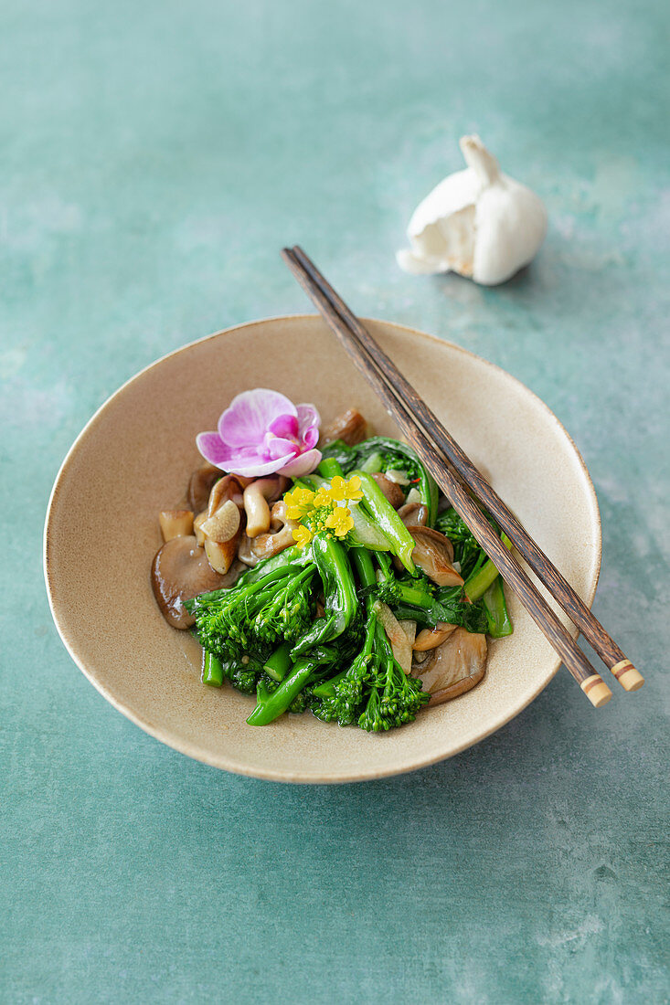 Water spinach, broccolini and oyster mushrooms in Thai oyster sauce