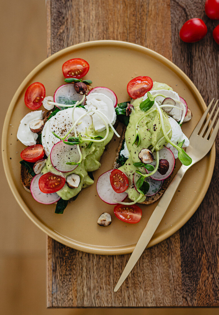 Avocado toast with radish and goat's cheese