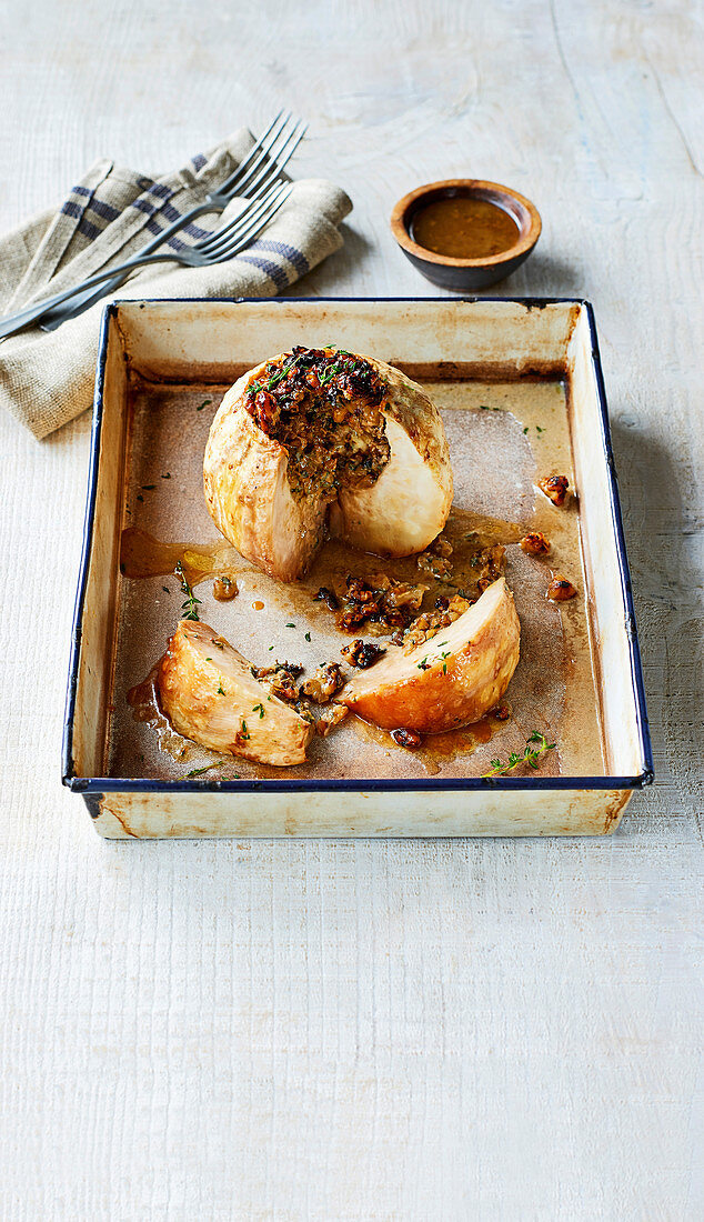 Whole baked celeriac with walnuts and blue cheese