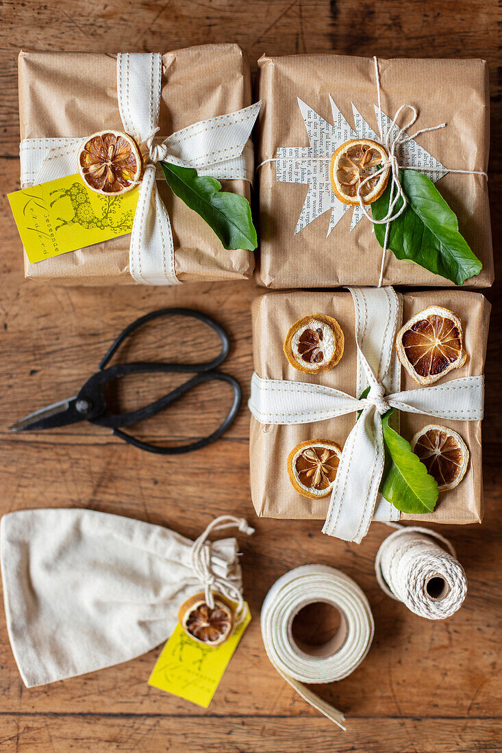 Christmas presents decorated with dried lemon slices