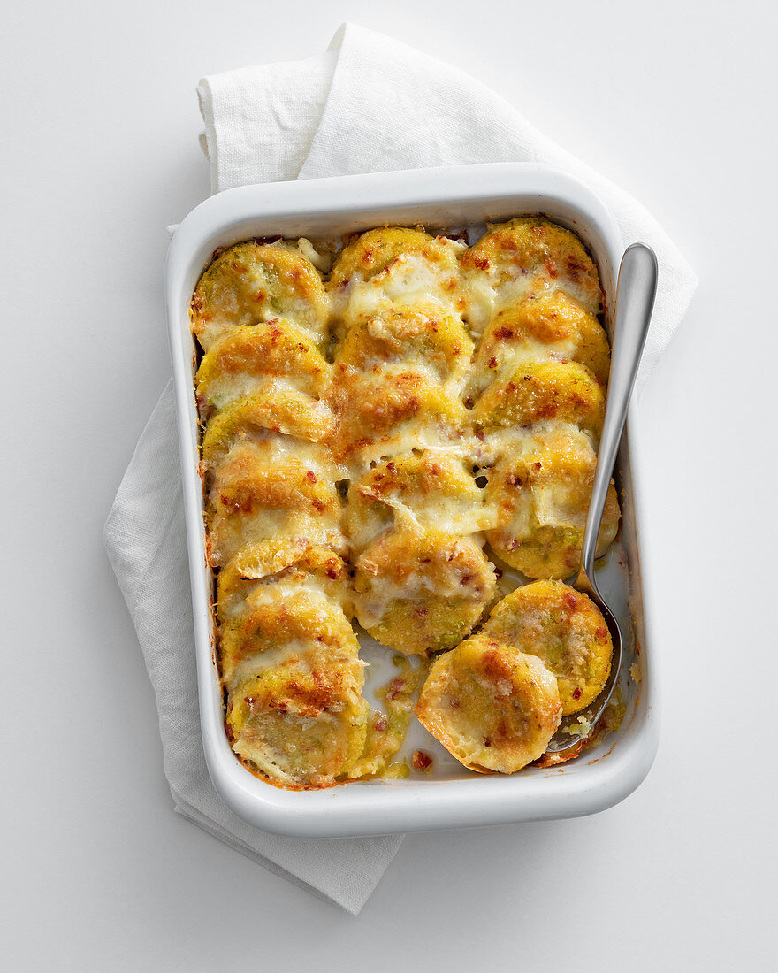 Gratinated bacon and savoy cabbage gnocchi with a cheese crust
