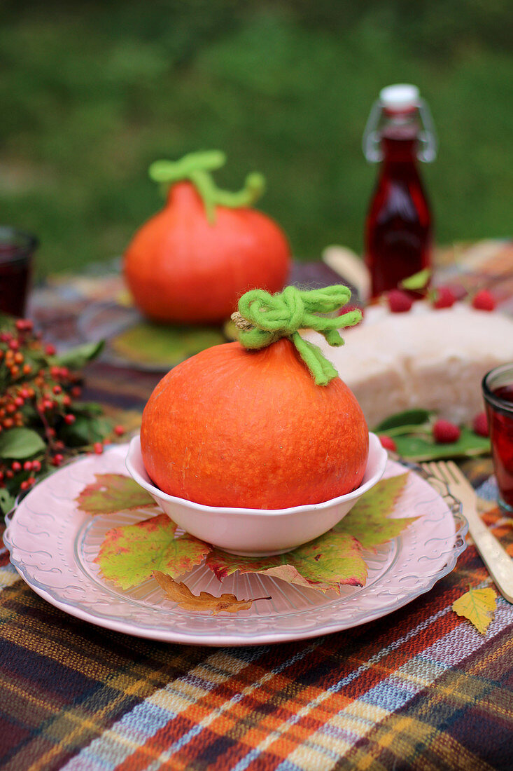 Autumnal table decorations with pumpkins