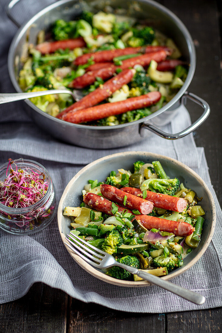 Sausages with veggies and mustard sauce
