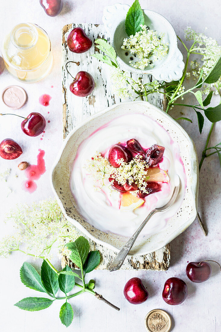 Yogurt with elderflower syrop and cherries