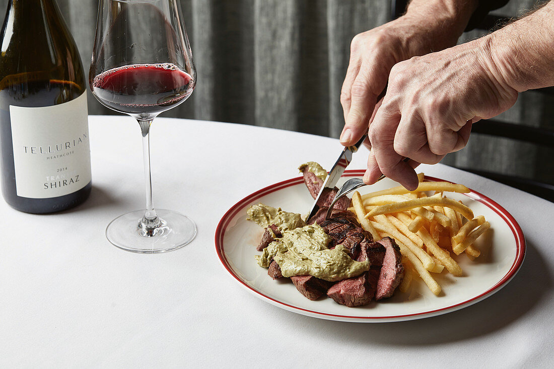 Pasture-fed porterhouse steak with Café de Paris butter and golden fries