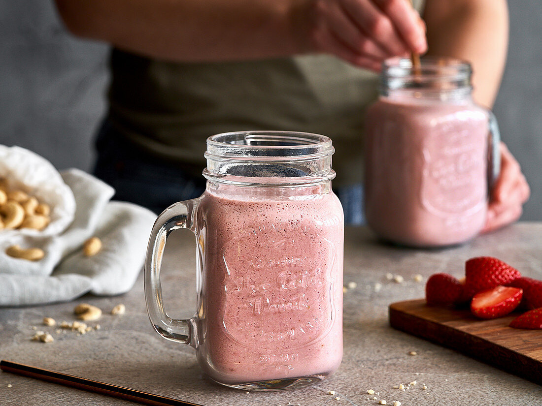 Strawberry protein shakes with cashew nut and almond milk