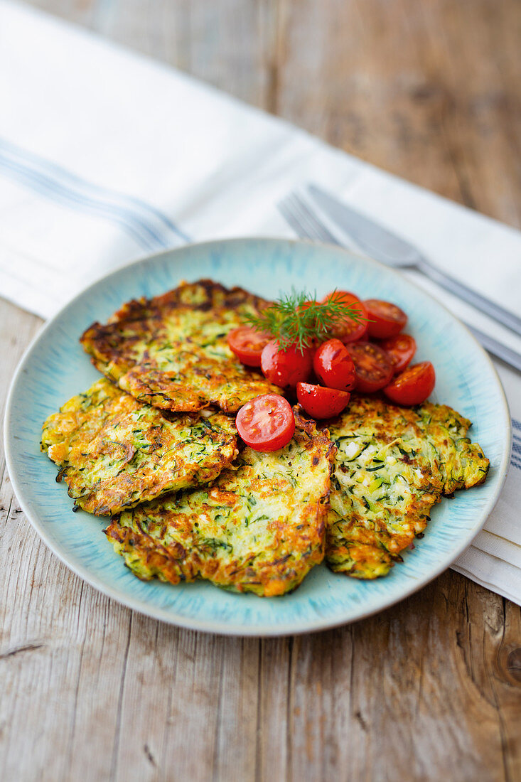 Courgette fritters with tomato salad