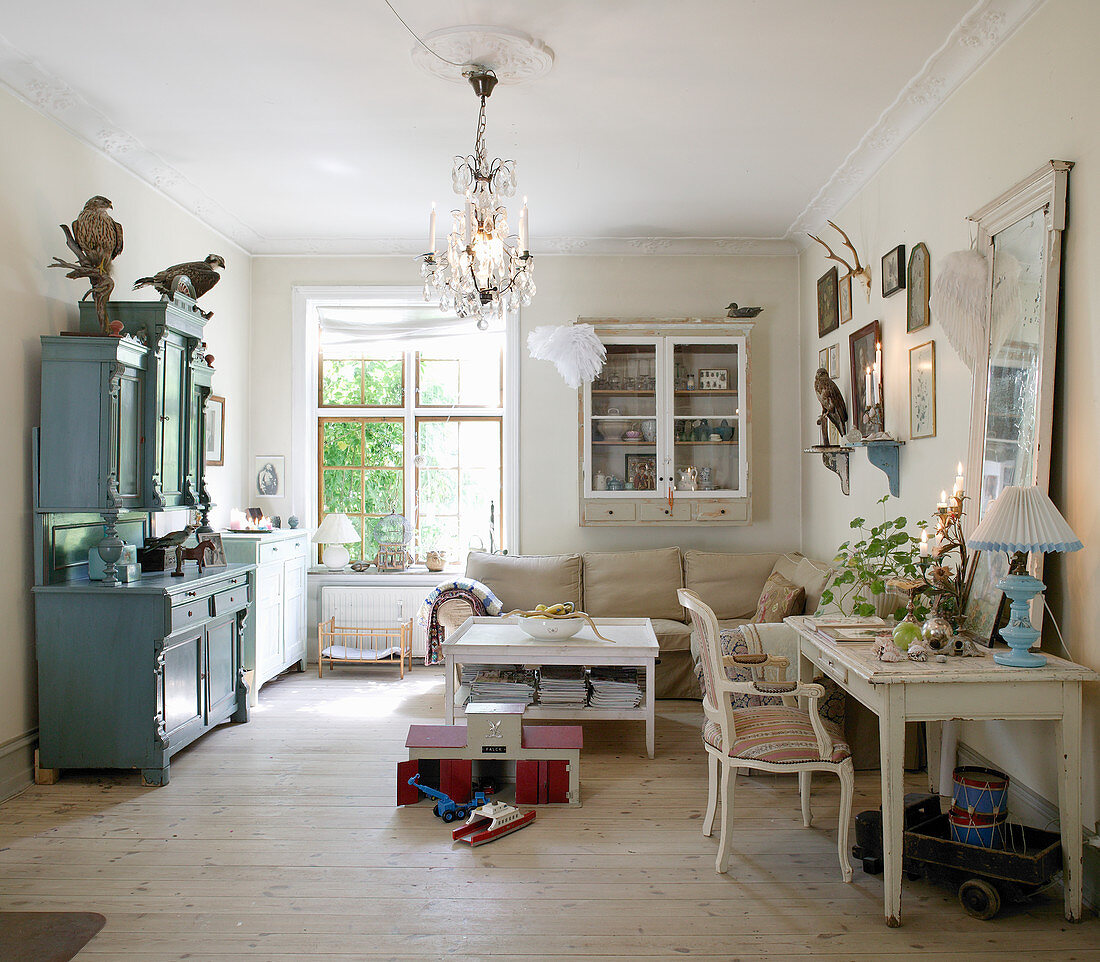 Blue dresser in shabby-chic living room