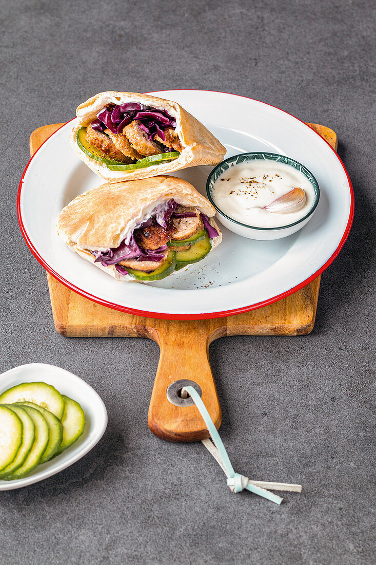 Pita bread filled with meatballs and coleslaw