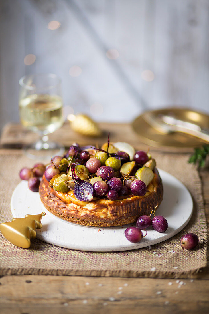 Cheesecake with roasted vegetables and grapes