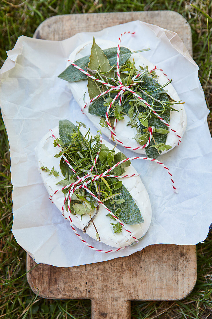 Camembert with fresh herbs for a barbecue