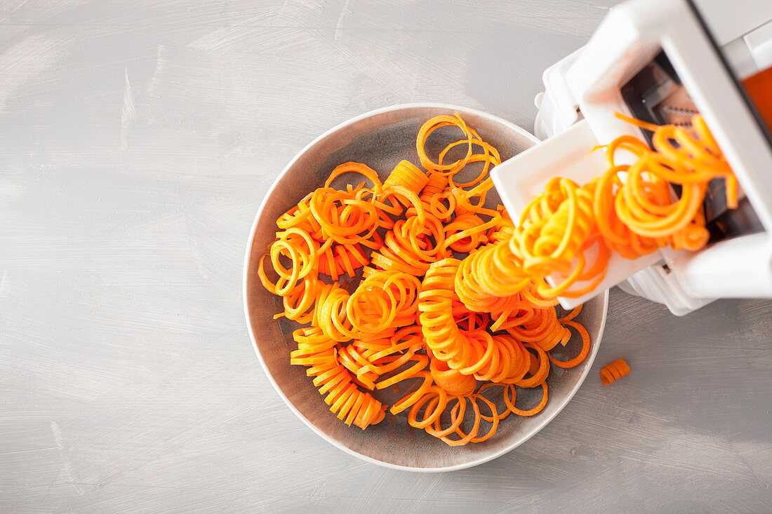 Carrot being spiralized