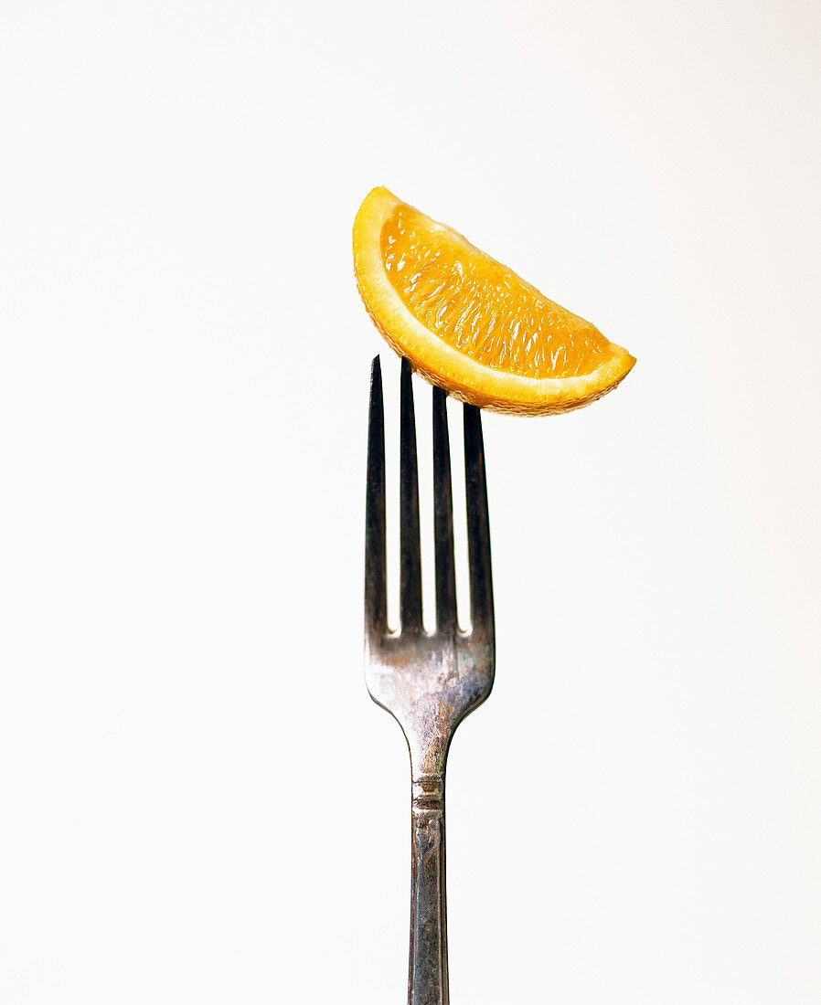 Orange slice on a fork