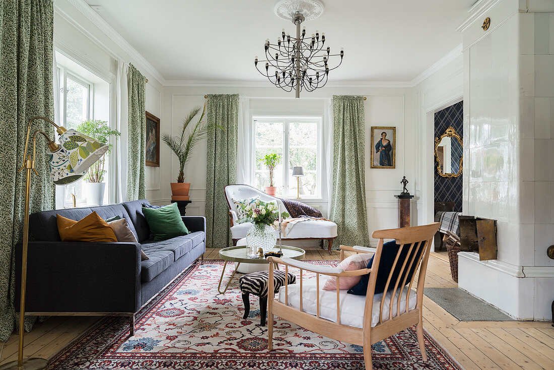 Classic, elegant living room with tiled stove in period building